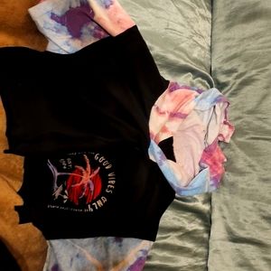 A small cropped hooded t-shirt in color black with tie dye